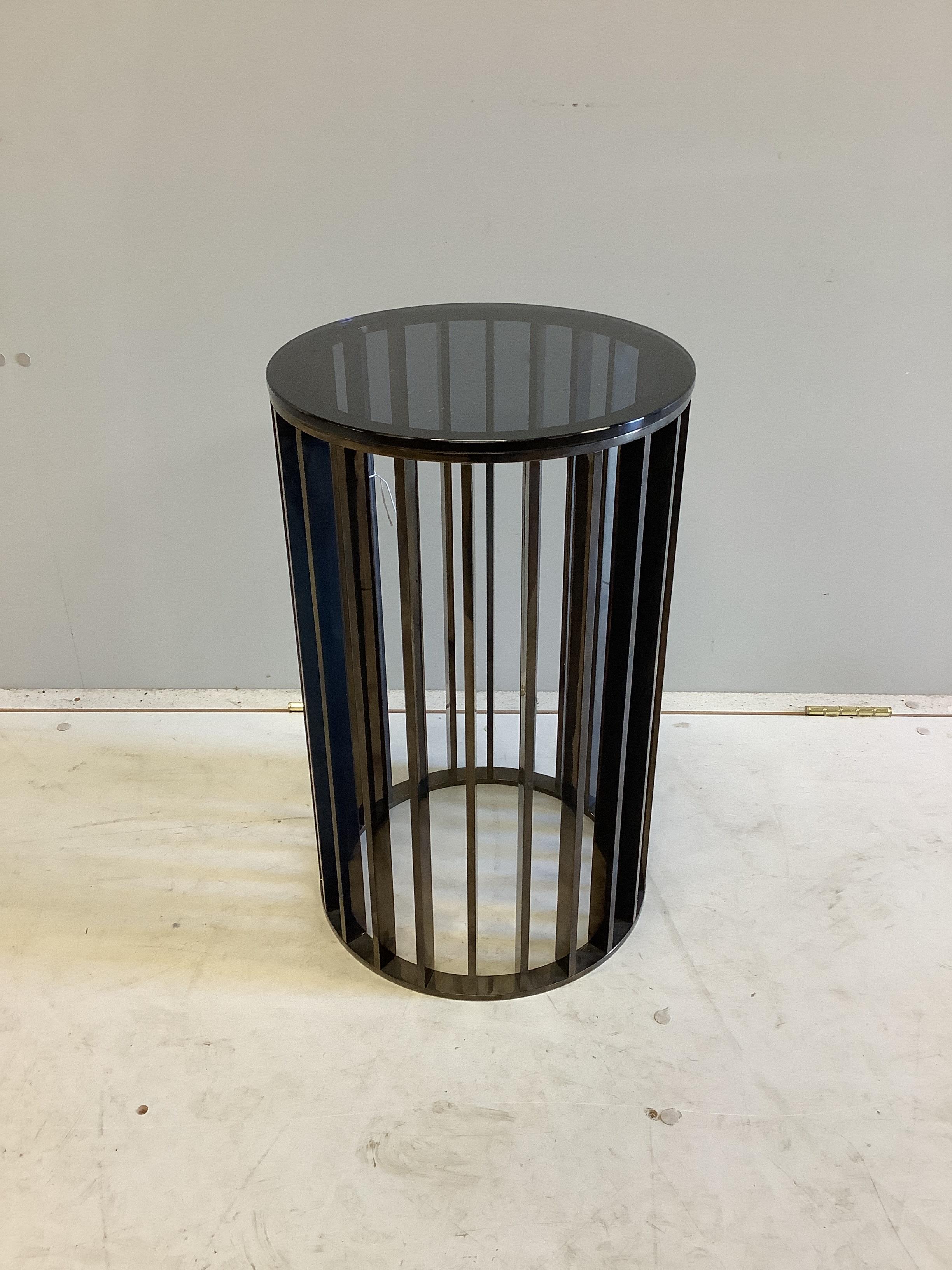 A custom made Louis Montrose (Dermer Hamlyn) round side table with Windsor black glass top, diameter 35cm, height 67cm